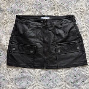 Vanilla Star Black Faux Leather Mini Skirt with Front Ring Zip